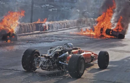 Chris Amon avoids burning wreckage of his teammate Lorenzo Bandini's Ferrari 312 at the 1967 Monaco GP