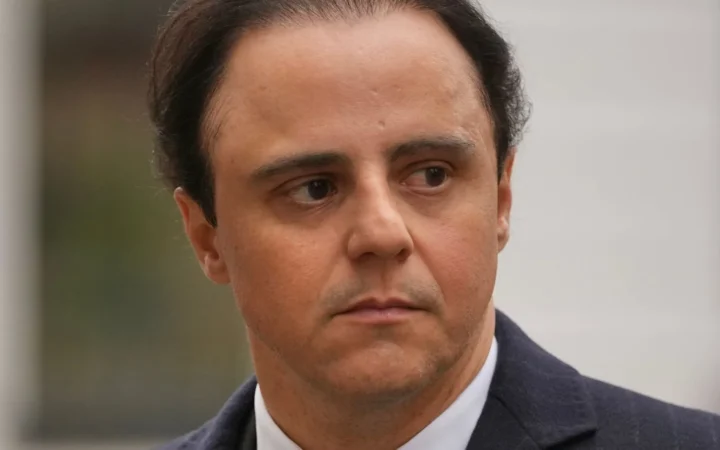 Former Ferrari Formula 1 driver Felipe Massa leaves the Royal Courts of Justice in London